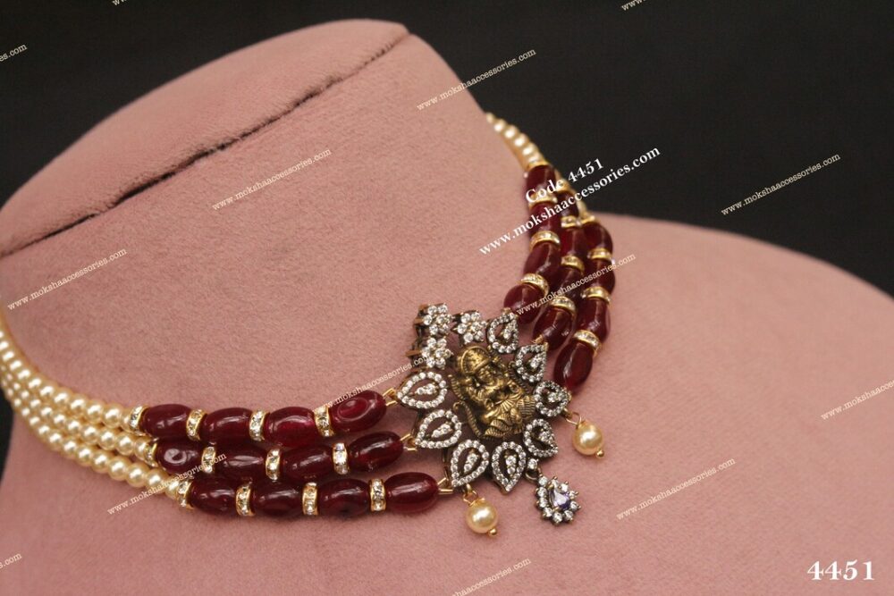 Ruby beads with lakshmi pendant
