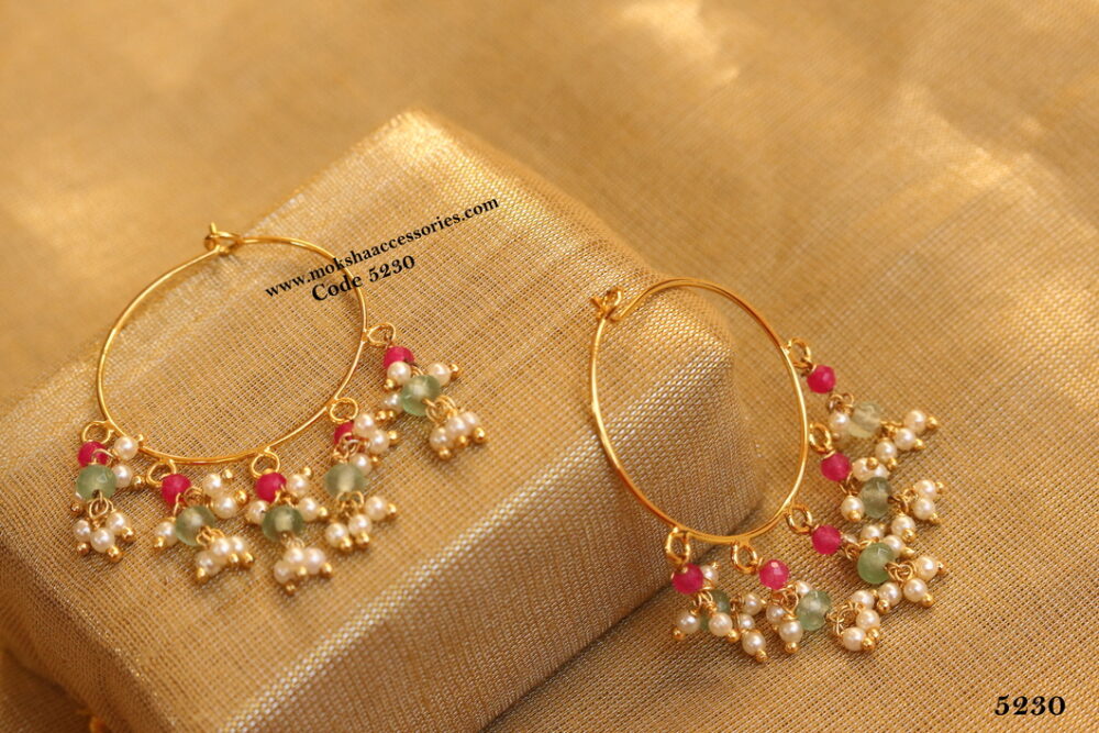 Hoops with ruby and emerald drops