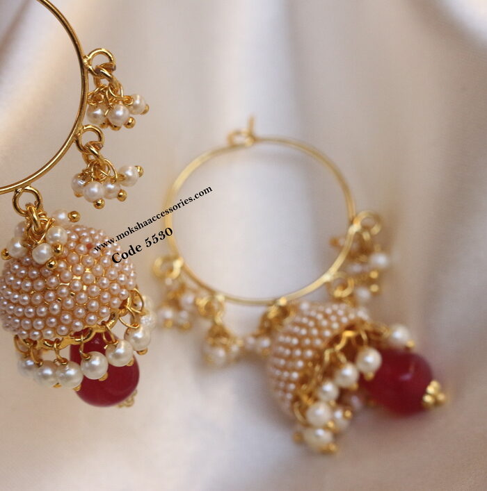 Earrings with pearl jhumki and ruby drop