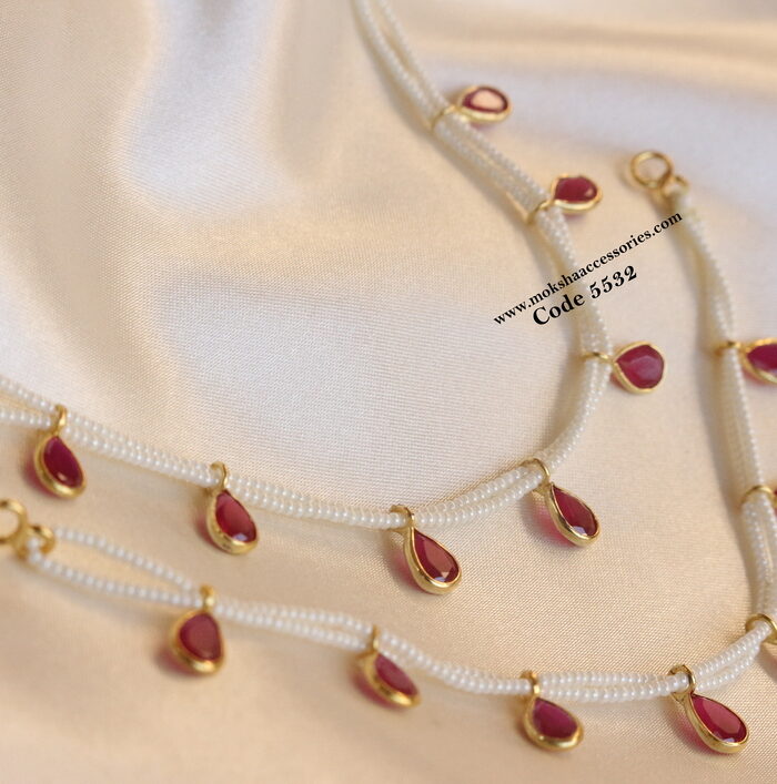 Earchains with pearl and ruby drops