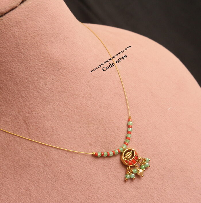 Invisible wire with coral  pendant and real cz drops