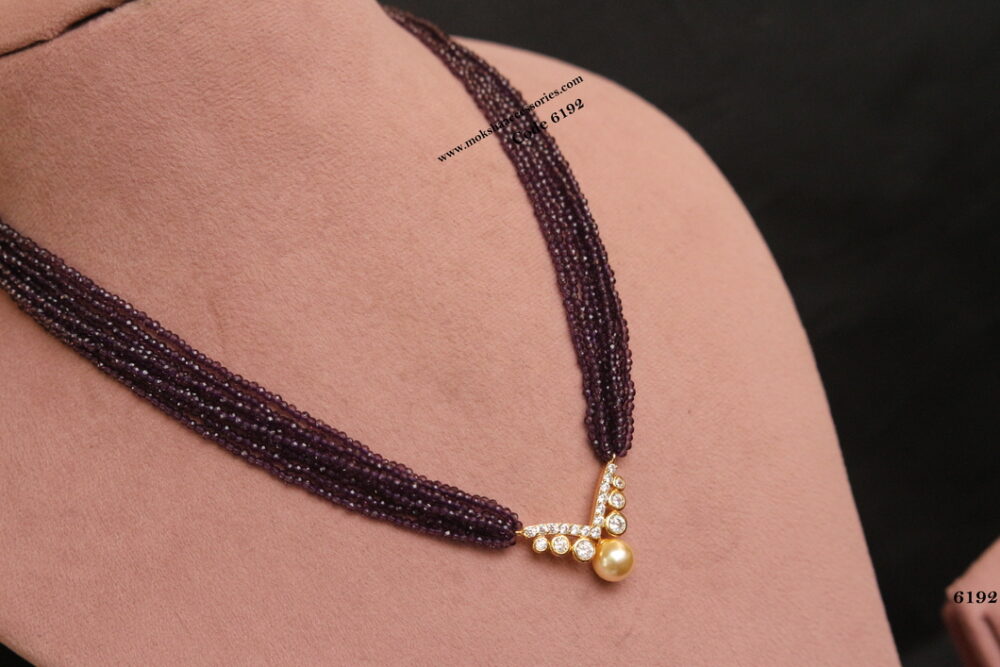CZ pendant with purple cz beads