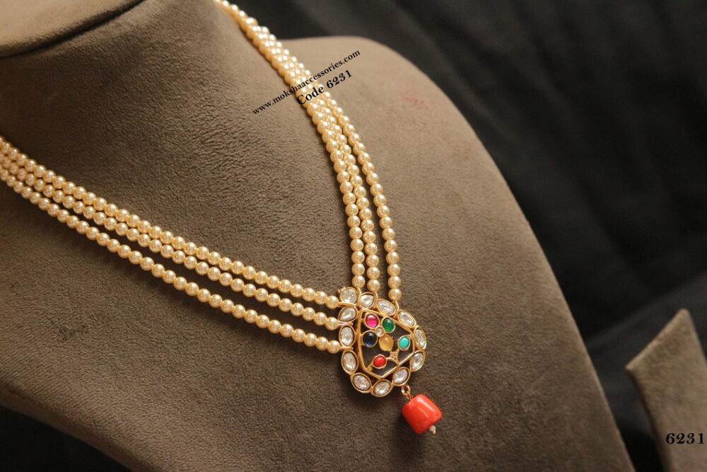 Navratan kundan pendant with sarvoski pearl mala