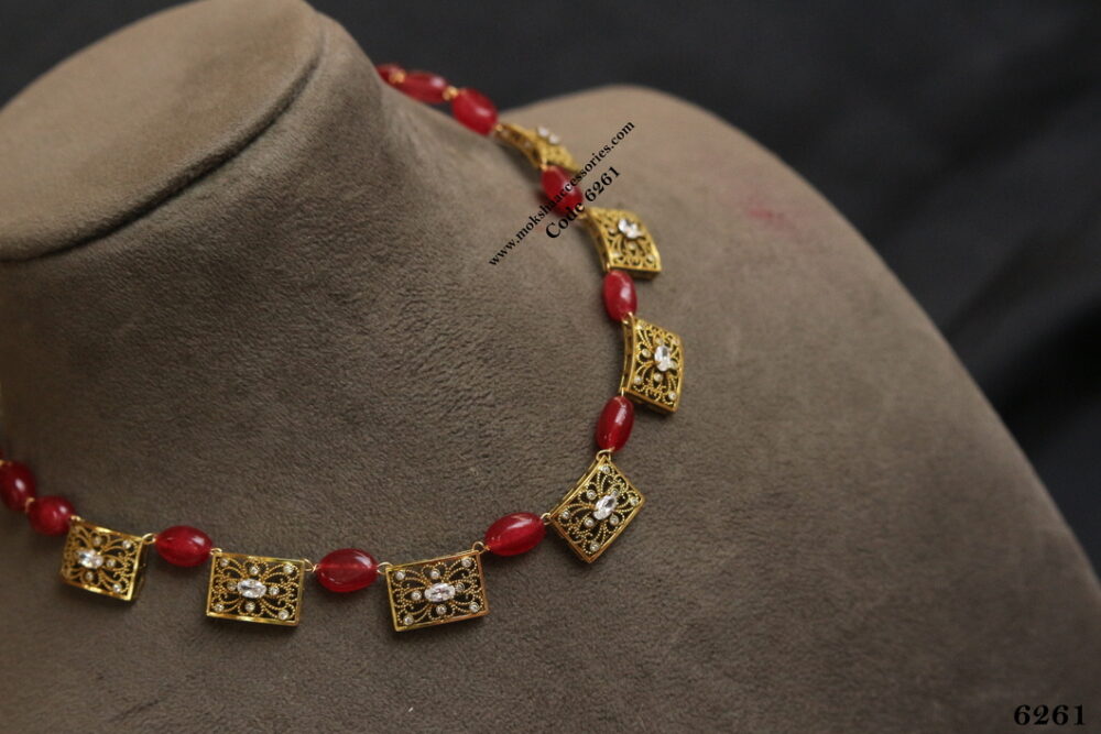 Antique necklace with ruby beads