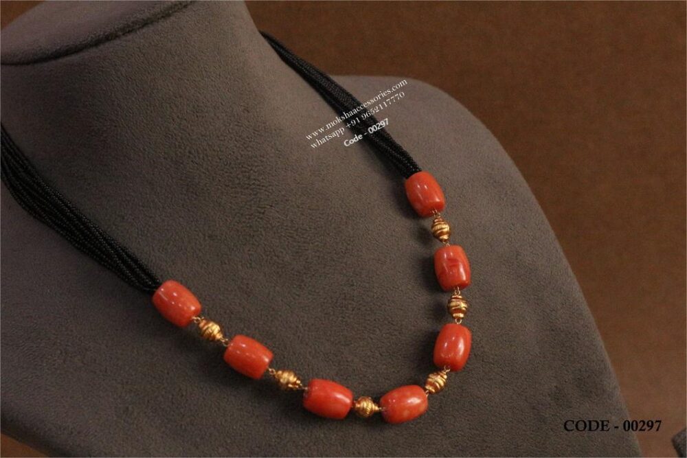 Coral with black beads