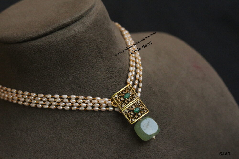 Antique pendant with rice pearl choker