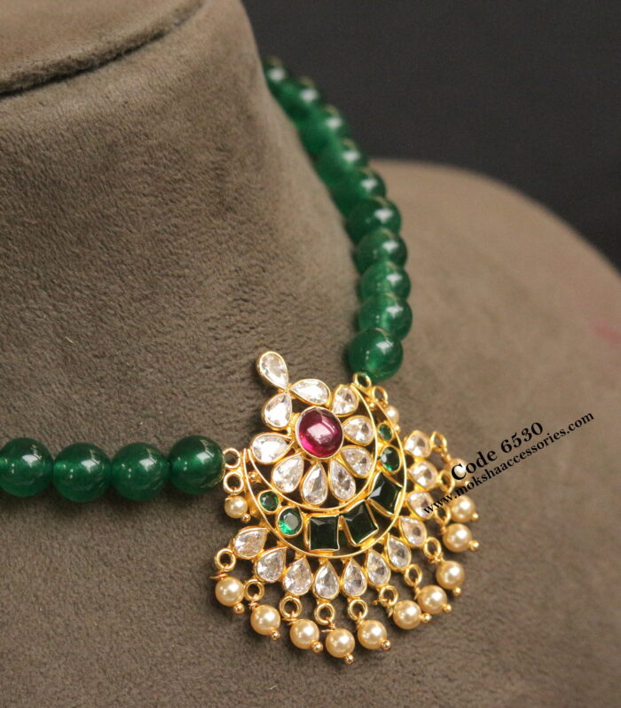 CZ pendant with emerald beads