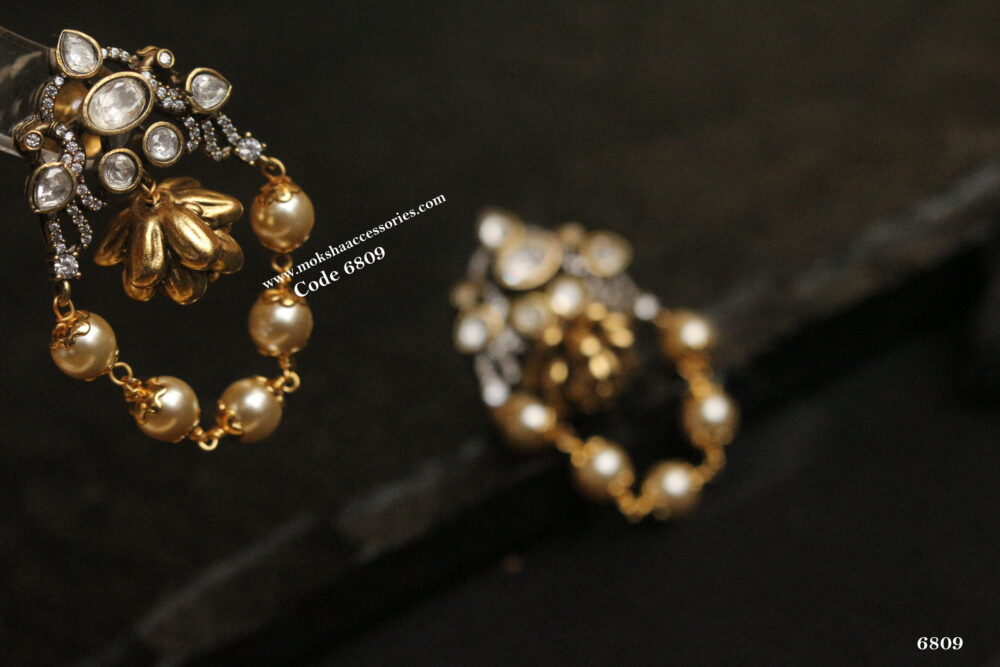 Antique gold earrings with mozonite stones and antique gold ball