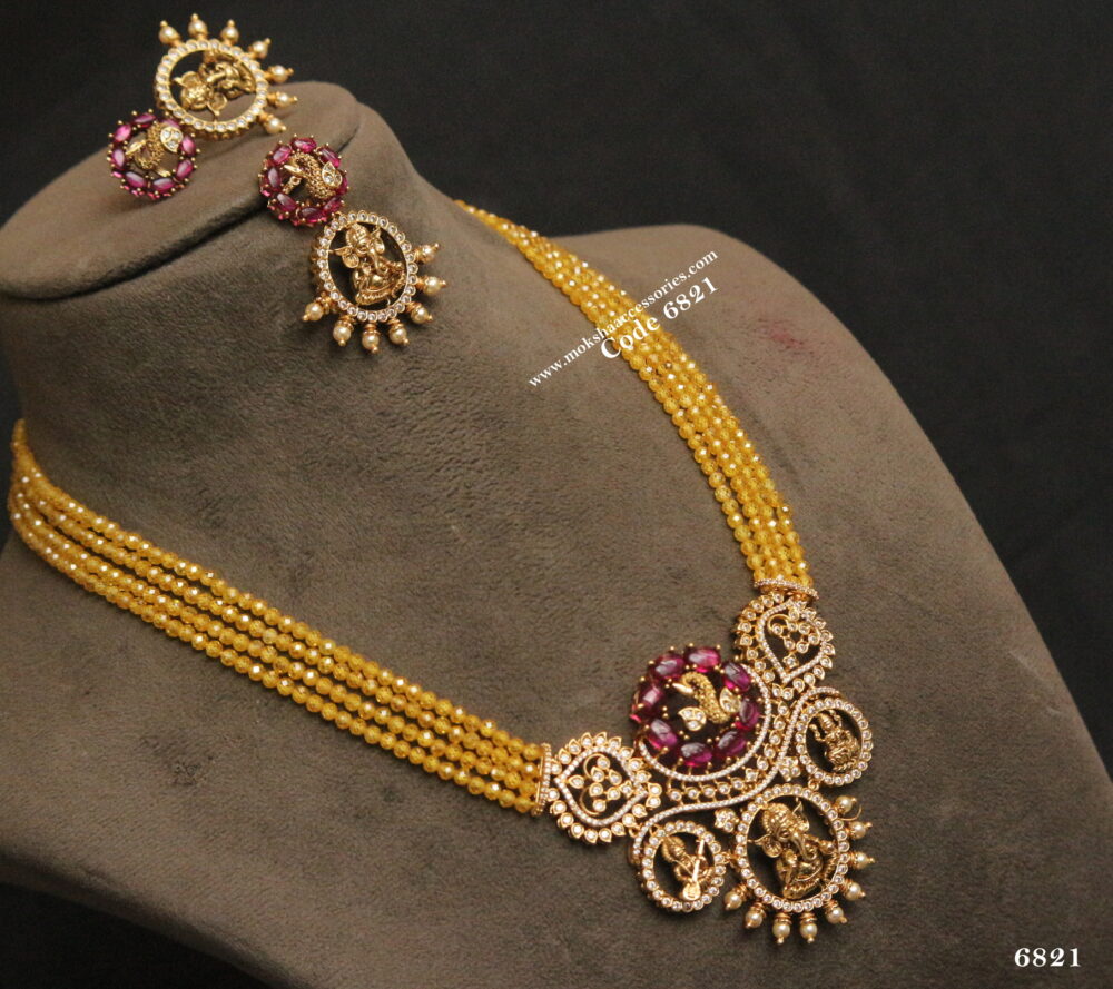 Ganesh pendant set with real cz yellow beads
