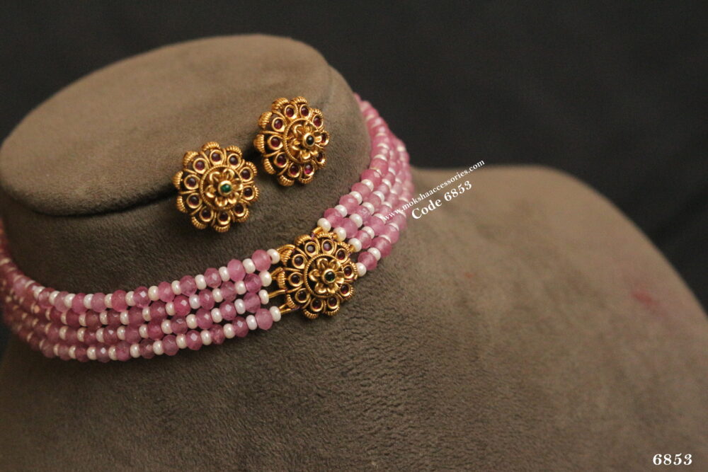 Antique pendant set with pearl and pink beads