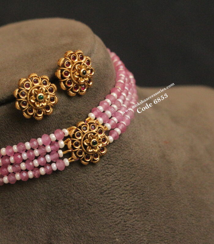 Antique pendant set with pearl and pink beads