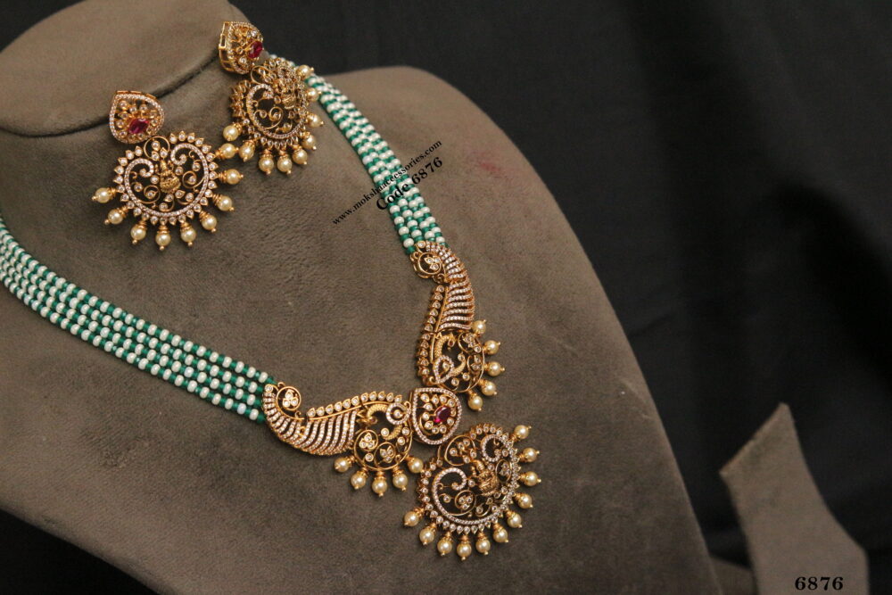 Antique pendant set with pearl and real cz green beads