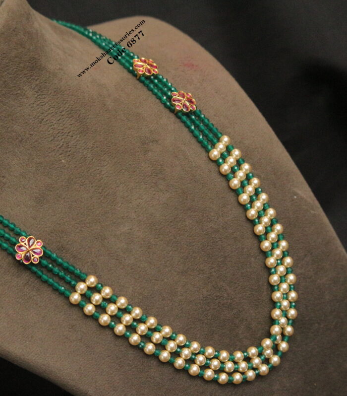CZ flower pendants with real emerald and sarvoski pearl mala