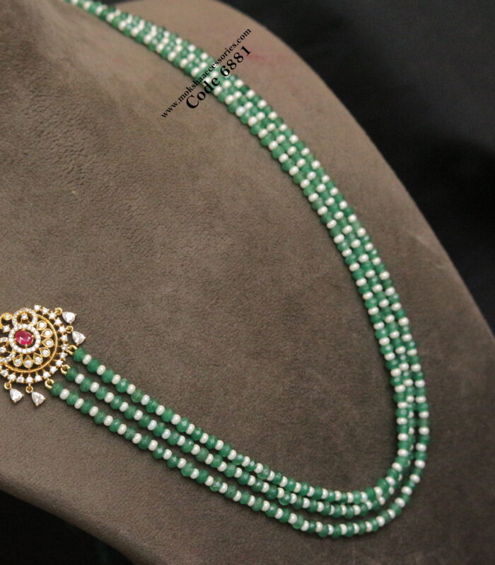CZ side pendant with emerald and pearl mala