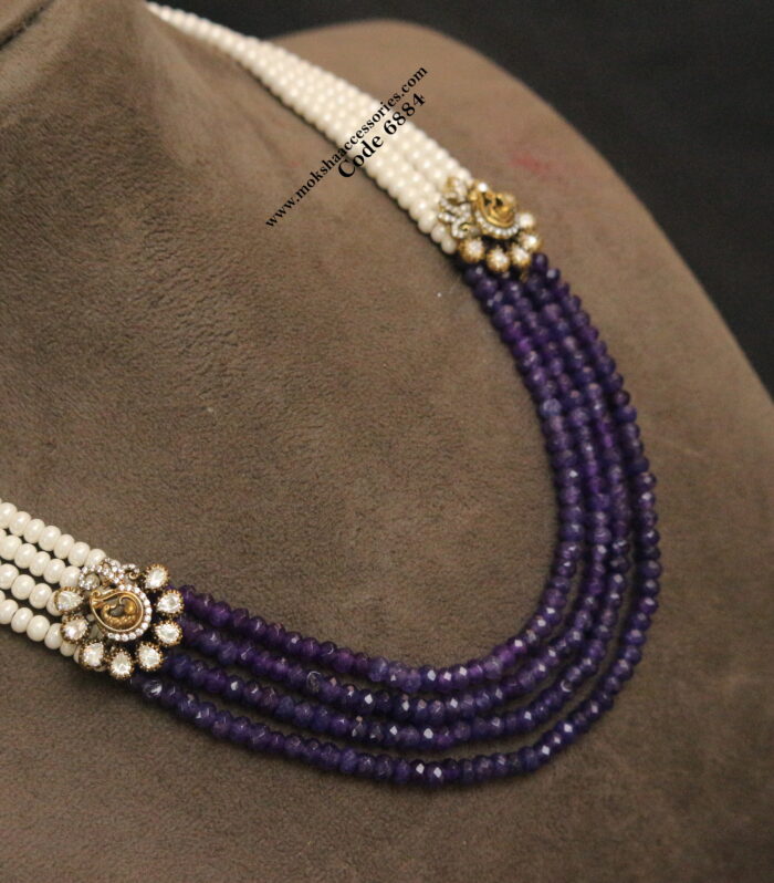 Peacock pendants with purple and pearl mala