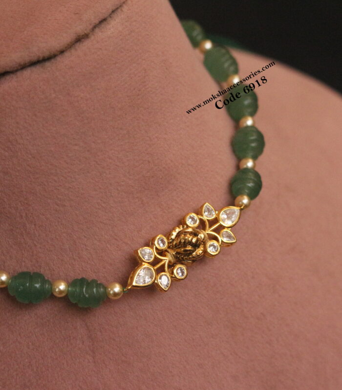 CZ pendant with real emerald beads