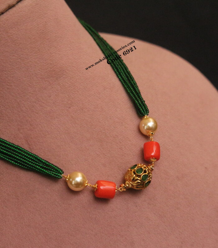 Antique emerald stone ball with real coral and green beads