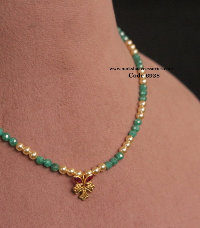 Real crush green beads with sarvoski pearl and cz pendant
