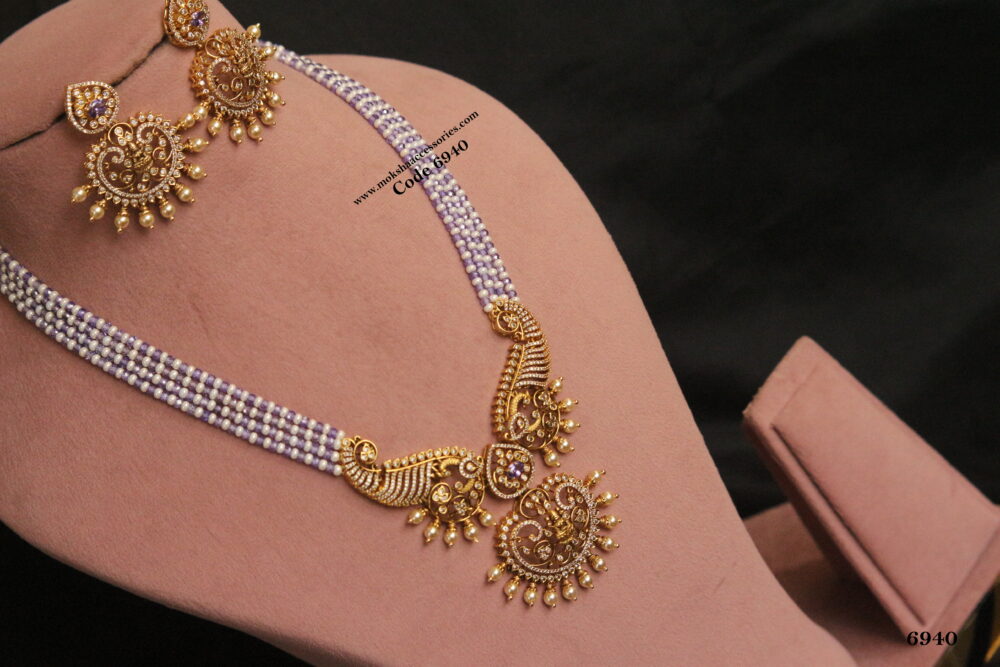 Antique gold pendant set with real cz purple beads and pearl mala