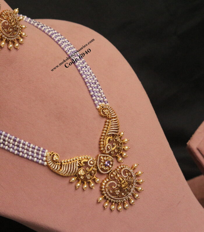 Antique gold pendant set with real cz purple beads and pearl mala