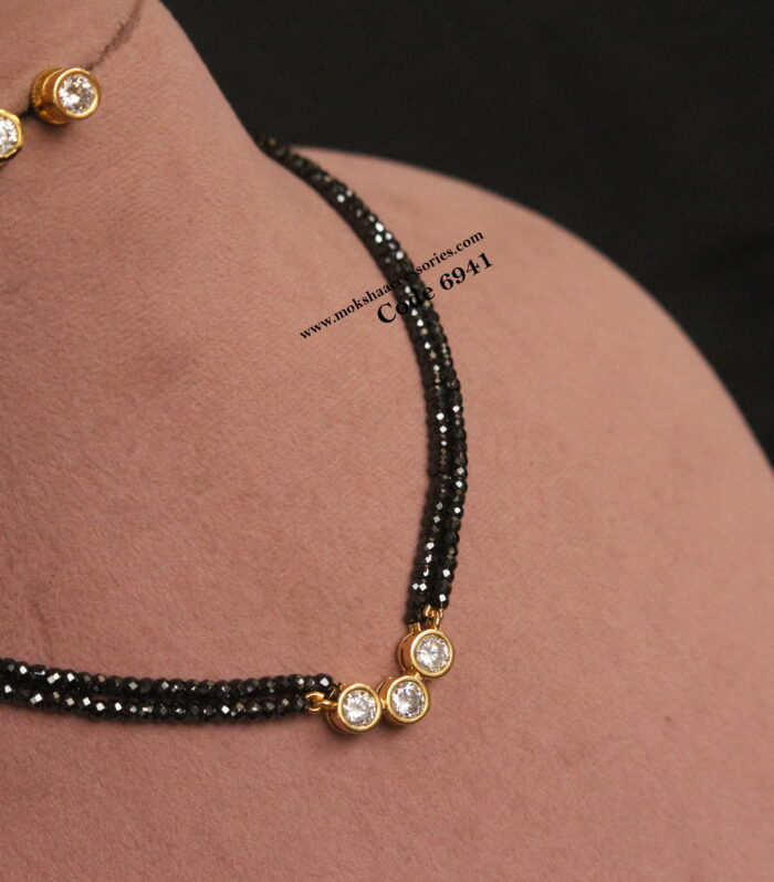 CZ pendant set with real cz black beads