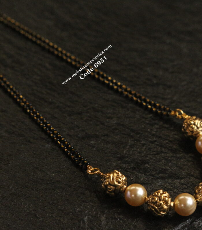 Antique gold balls with sarvoski pearl black beads chain