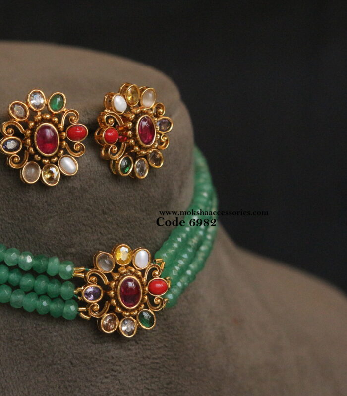 Navratan pendant set with emerald beads