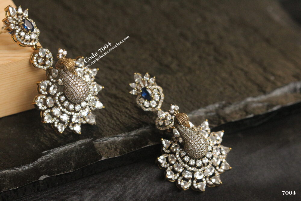 CZ stone peacock earrings with blue stone studs