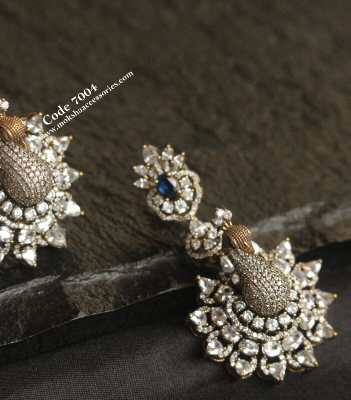 CZ stone peacock earrings with blue stone studs