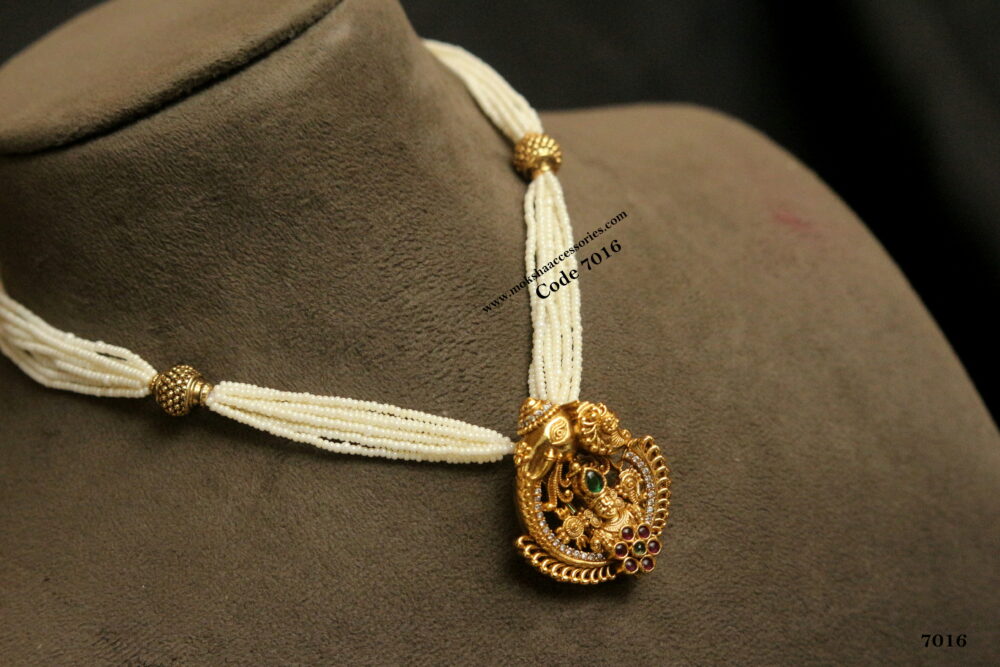 Antique gold pendant with pearl chain