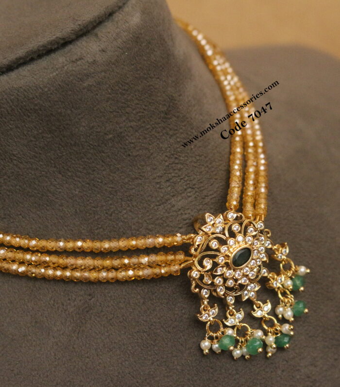 Gold cz pendant with real cz beads