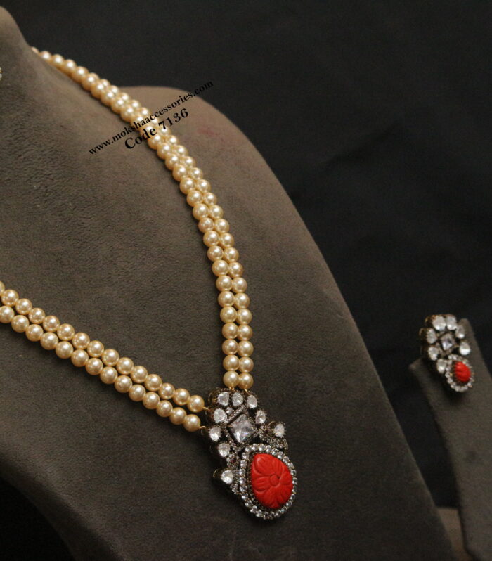 Mozonite stone coral pendant set with sarvoski pearl chain