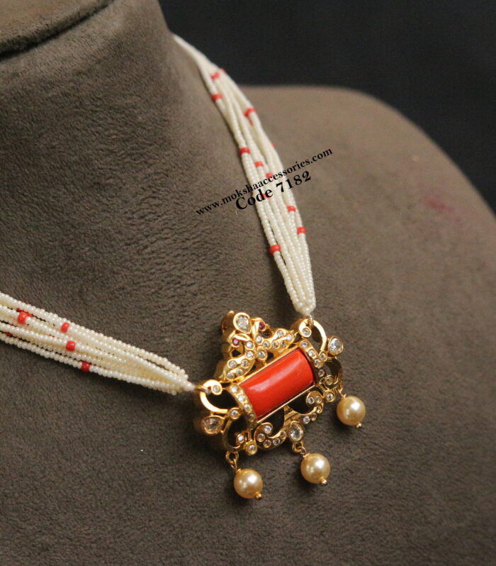 Gold coral pendant with pearl chain