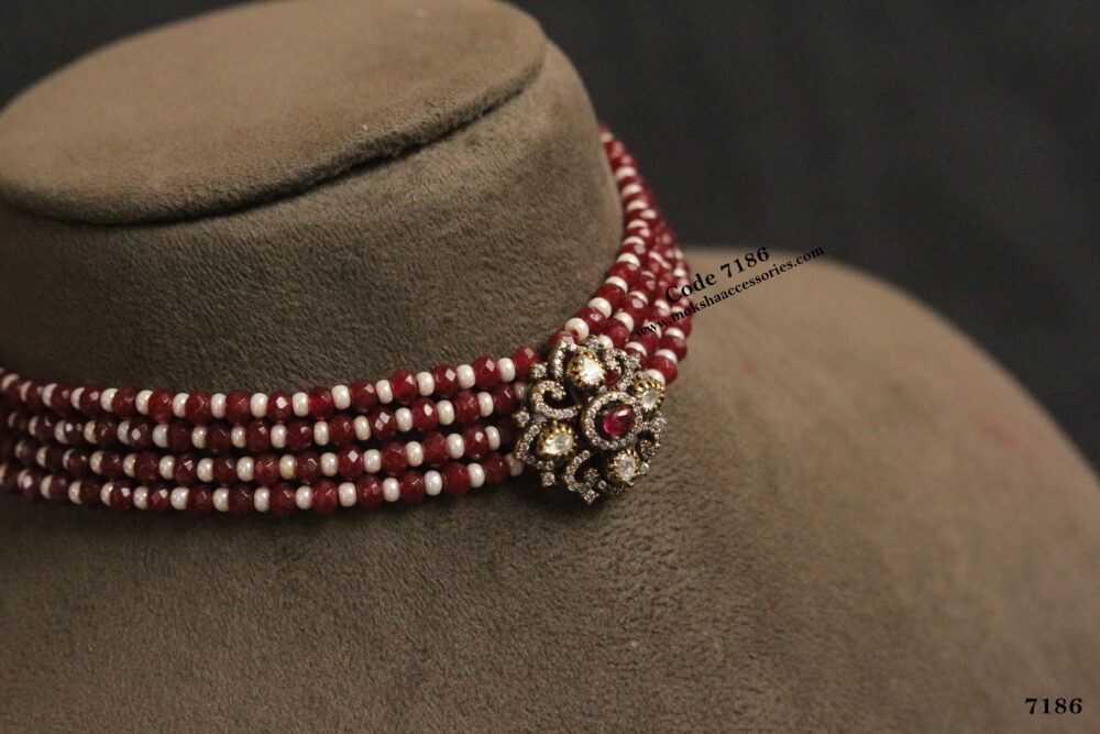 Antique gold pendant with ruby and pearl