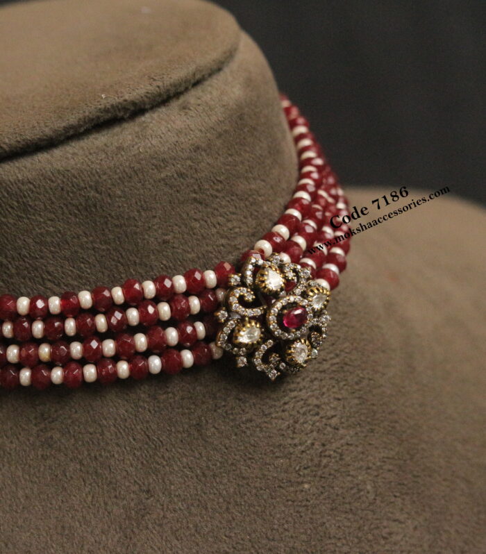 Antique gold pendant with ruby and pearl