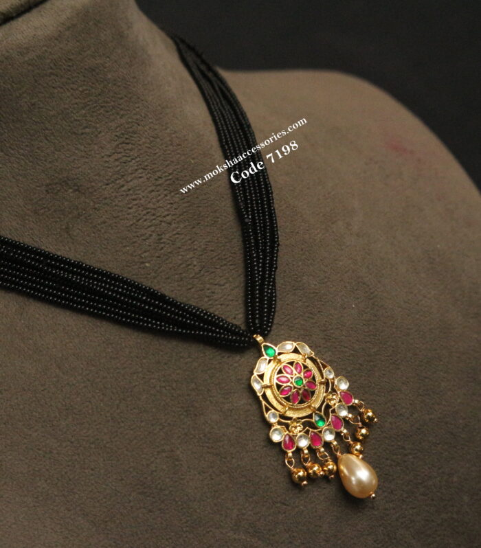 Black beads with jadaukundan gold pendant