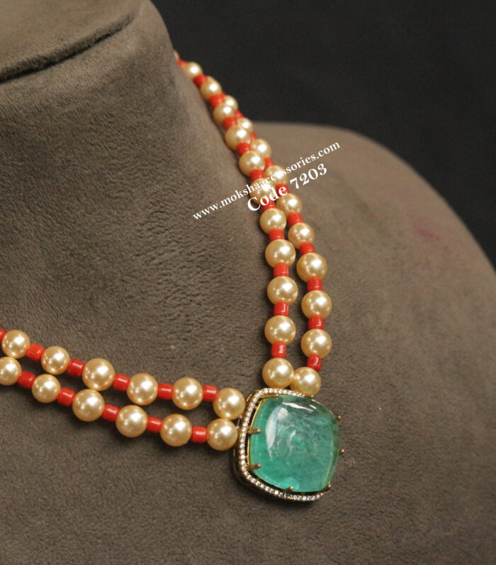 Emerald stone pendant with real coral and sarvoski pearls