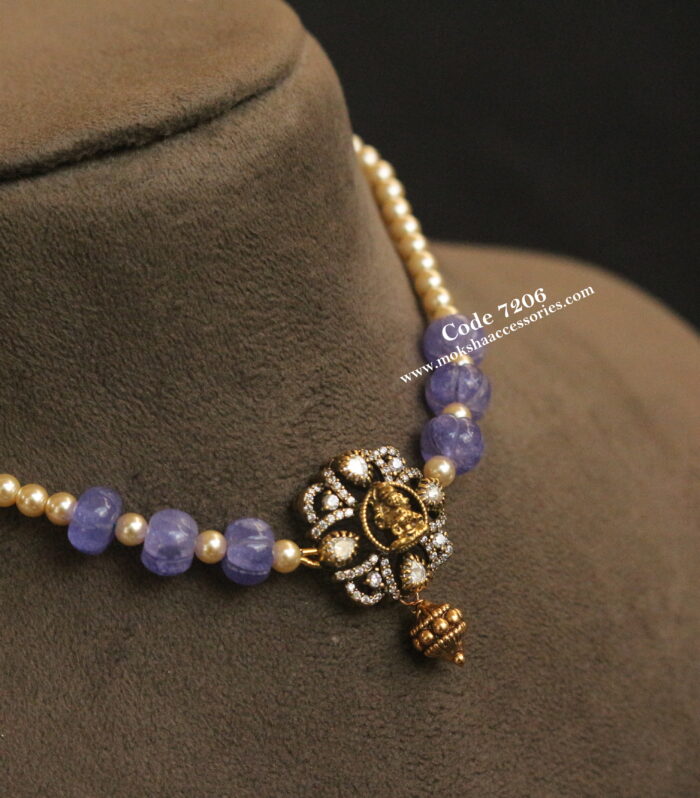 Laskshmi devi pendant with real purple pumpkin beads and sarvoski pearl