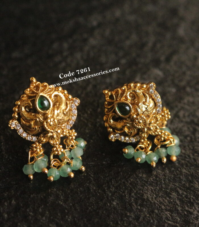 Studs with emerald drops