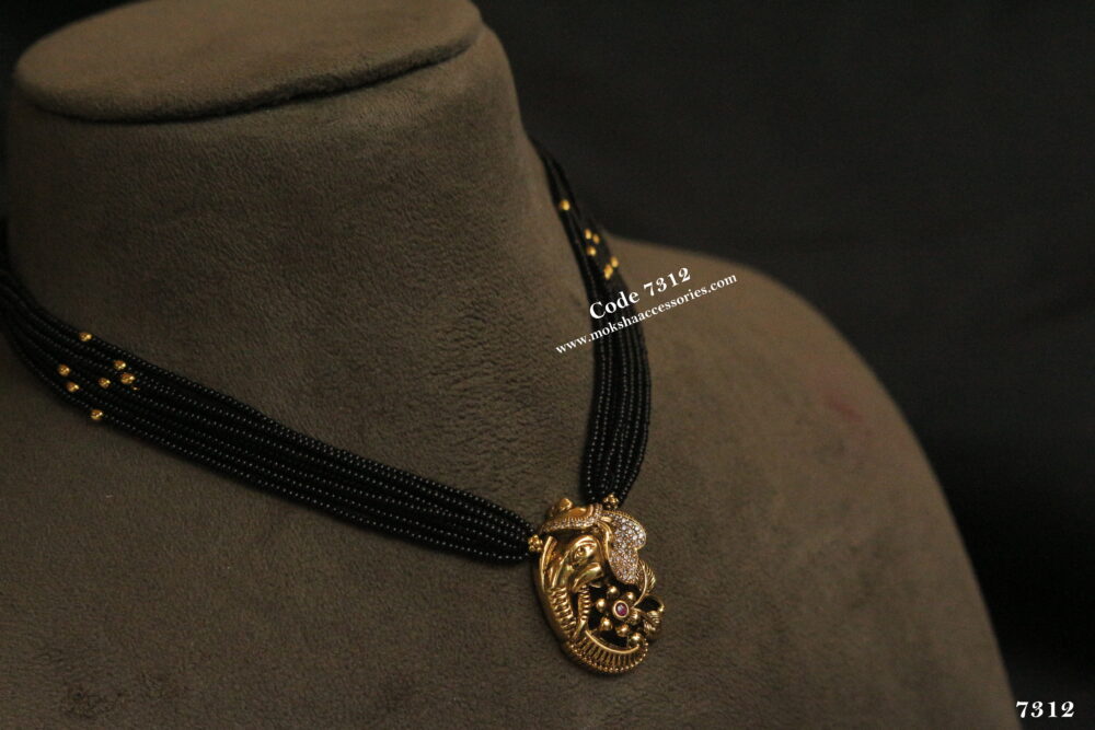 Ganesh antique gold pendant with black beads and gold balls