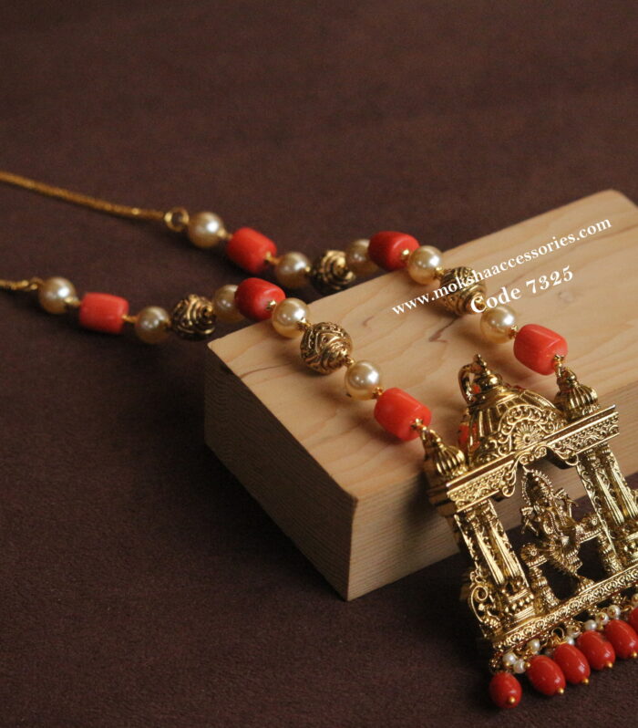 Krishna pendant with real coral and antique gold balls mala