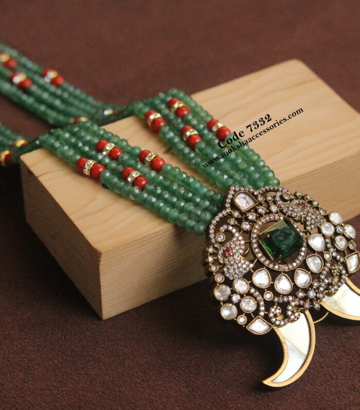 Mozonite stone pendant with emerald and real coral beads
