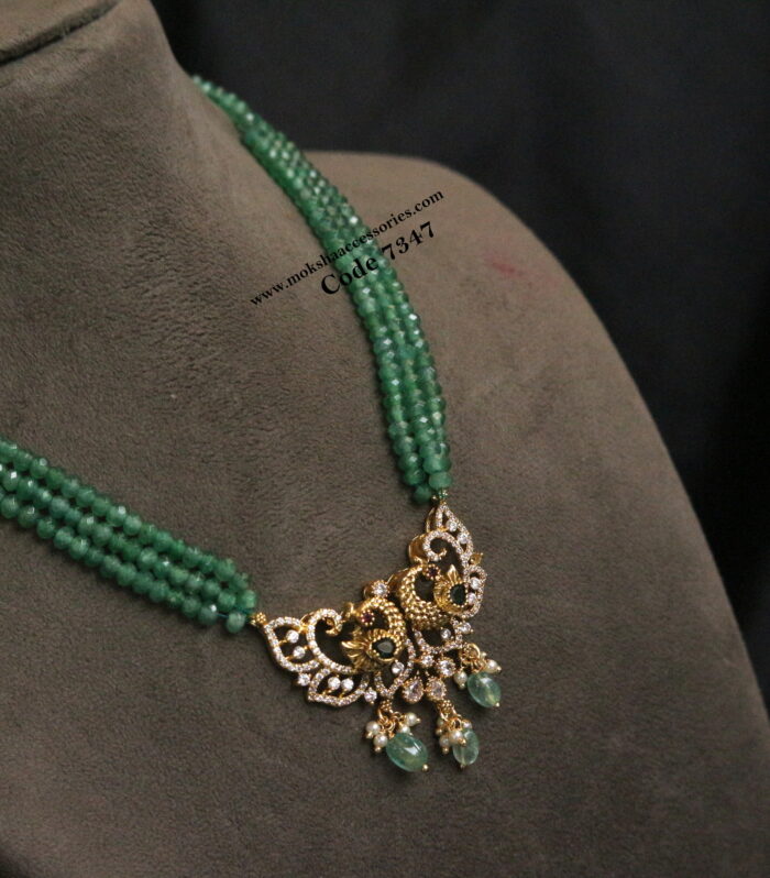 CZ pendant with emerald beads