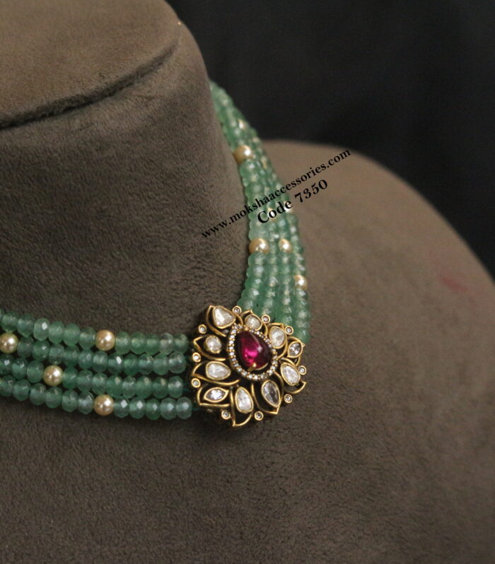 Antique gold pendant with emerald and sarvoski pearl choker