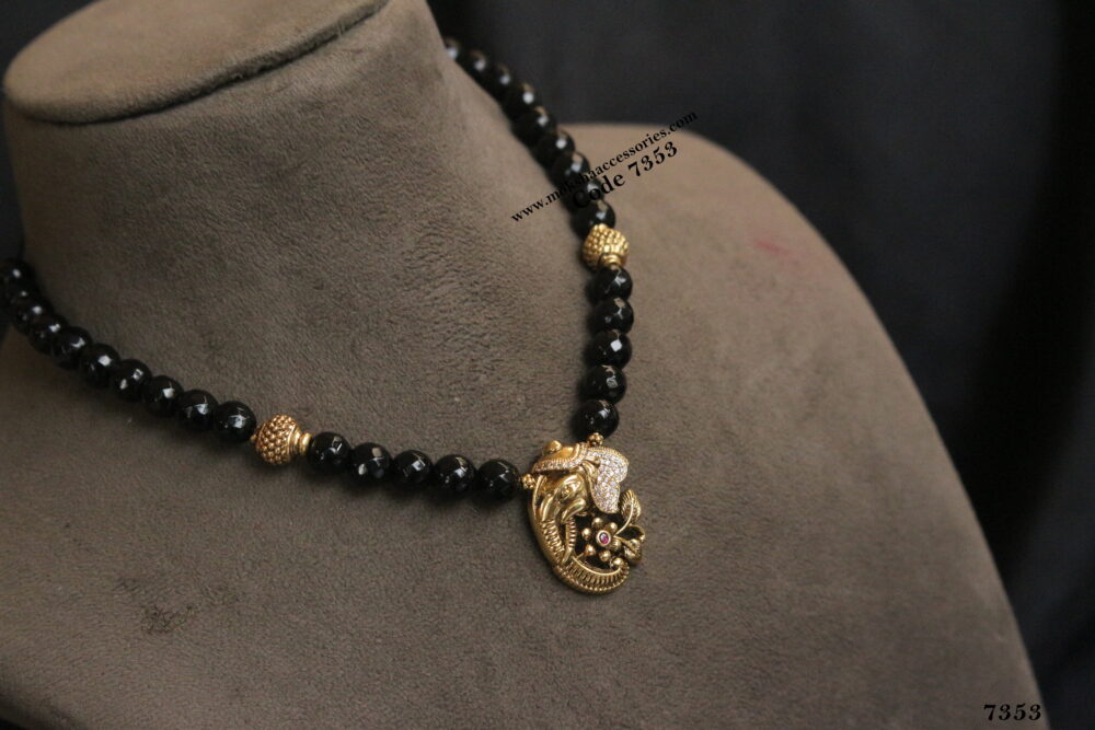 Black beads with ganesh pendant