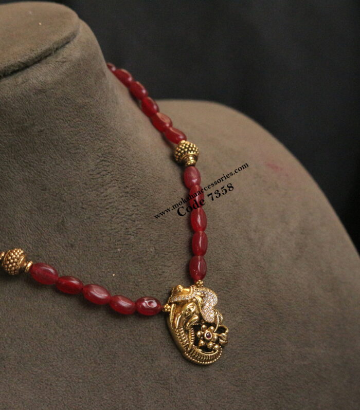 Ruby beads with ganesh pendant