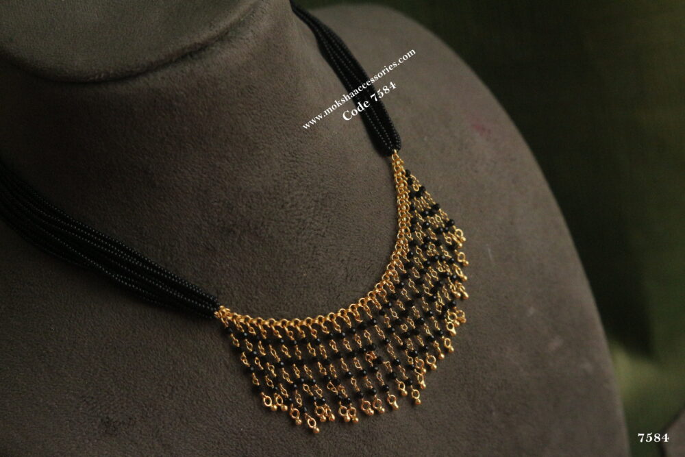 Black beads with gold drops