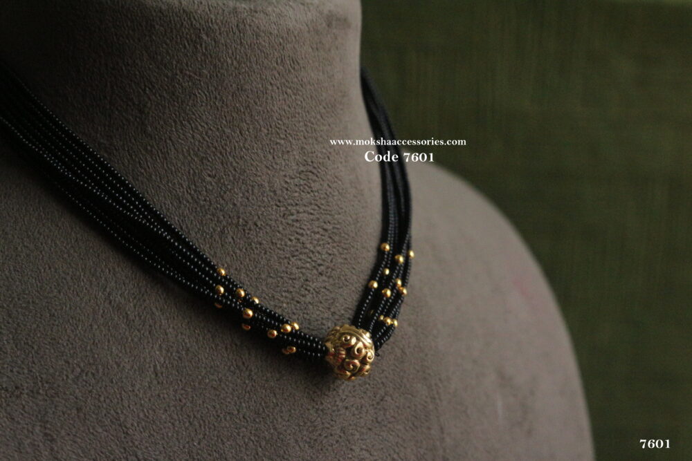 Antique gold balls with black beads