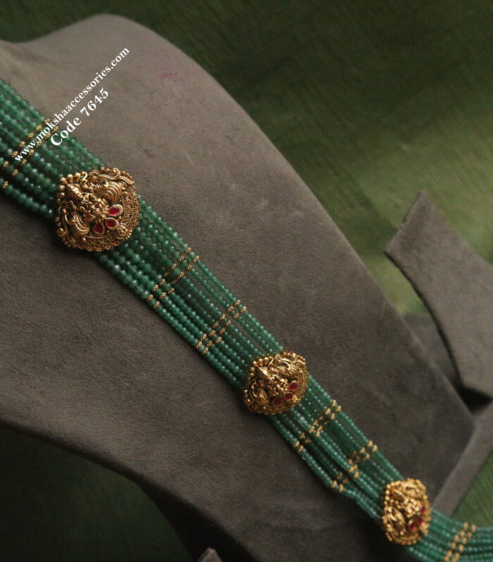 Bridal hair chain with emerald beads and lakshmi pendants