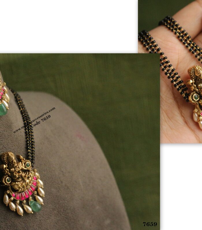 Lakshmi devi pendant set with black beads and real emerald drops and sarvoski pearls